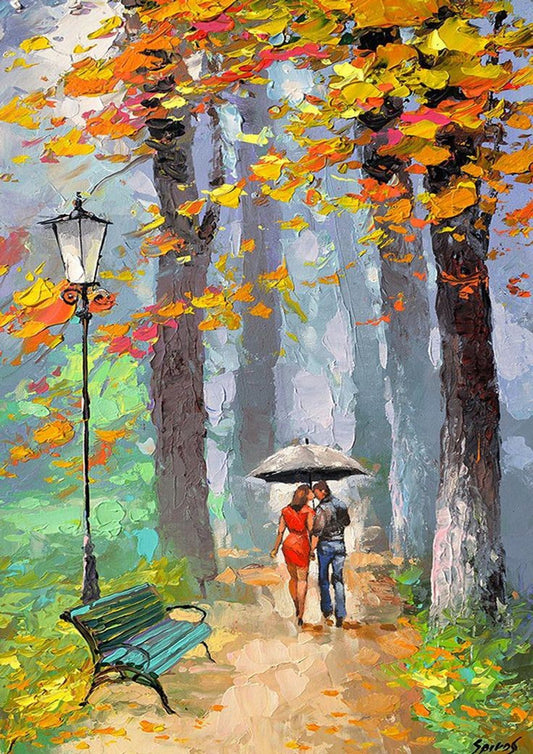 Cuplu sub umbrelă în parcul de toamnă